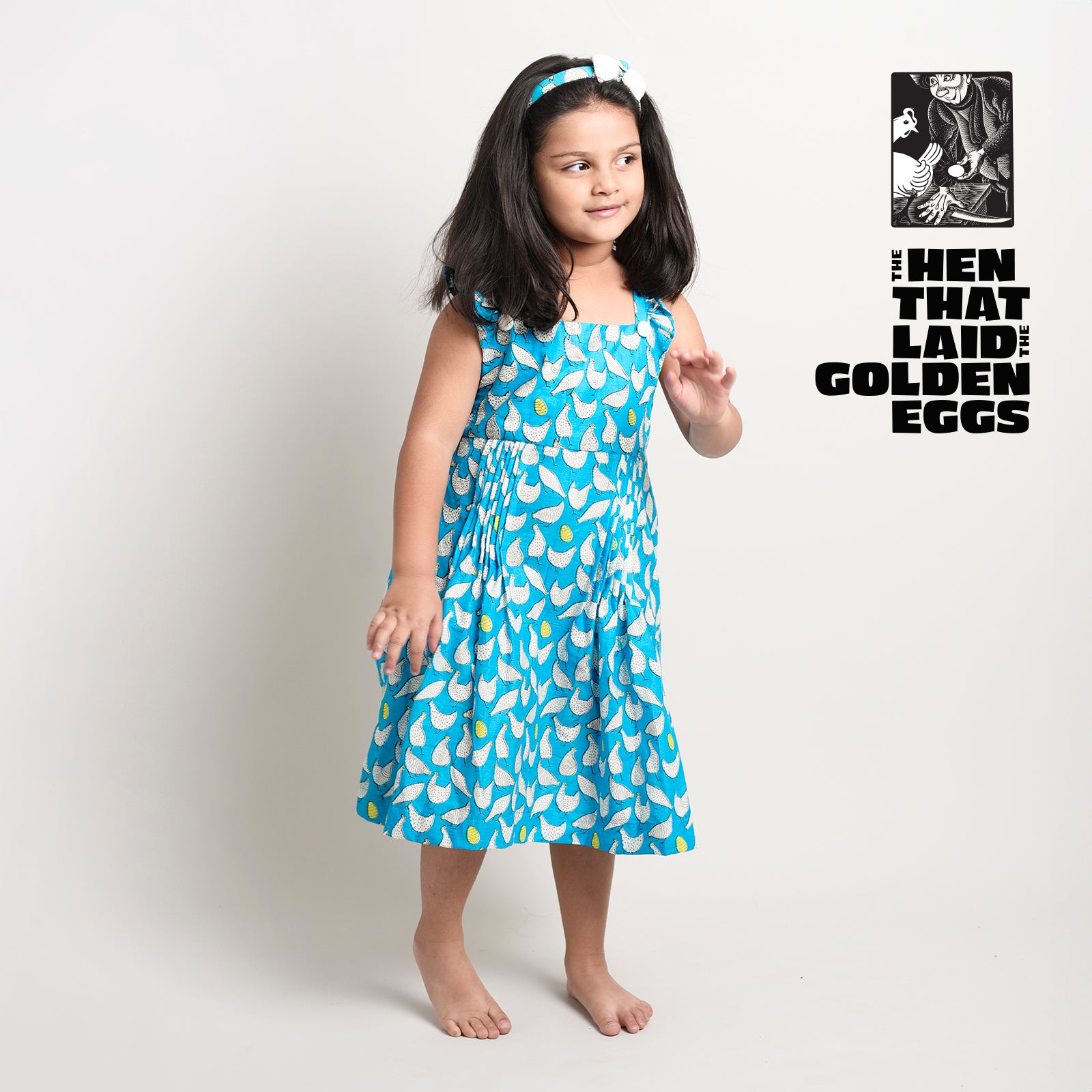 Cotton Printed Crisscross Frock For Girls with Hen That Laid The Golden Eggs Print