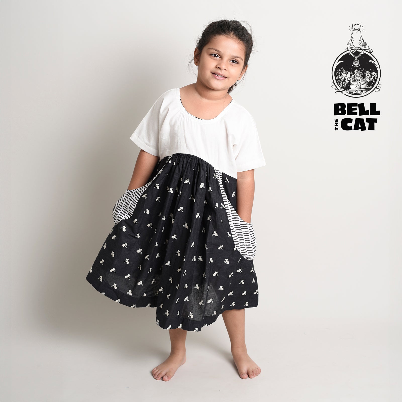 White Yoke Frock with Printed Charm & Pockets with Black Cat Story