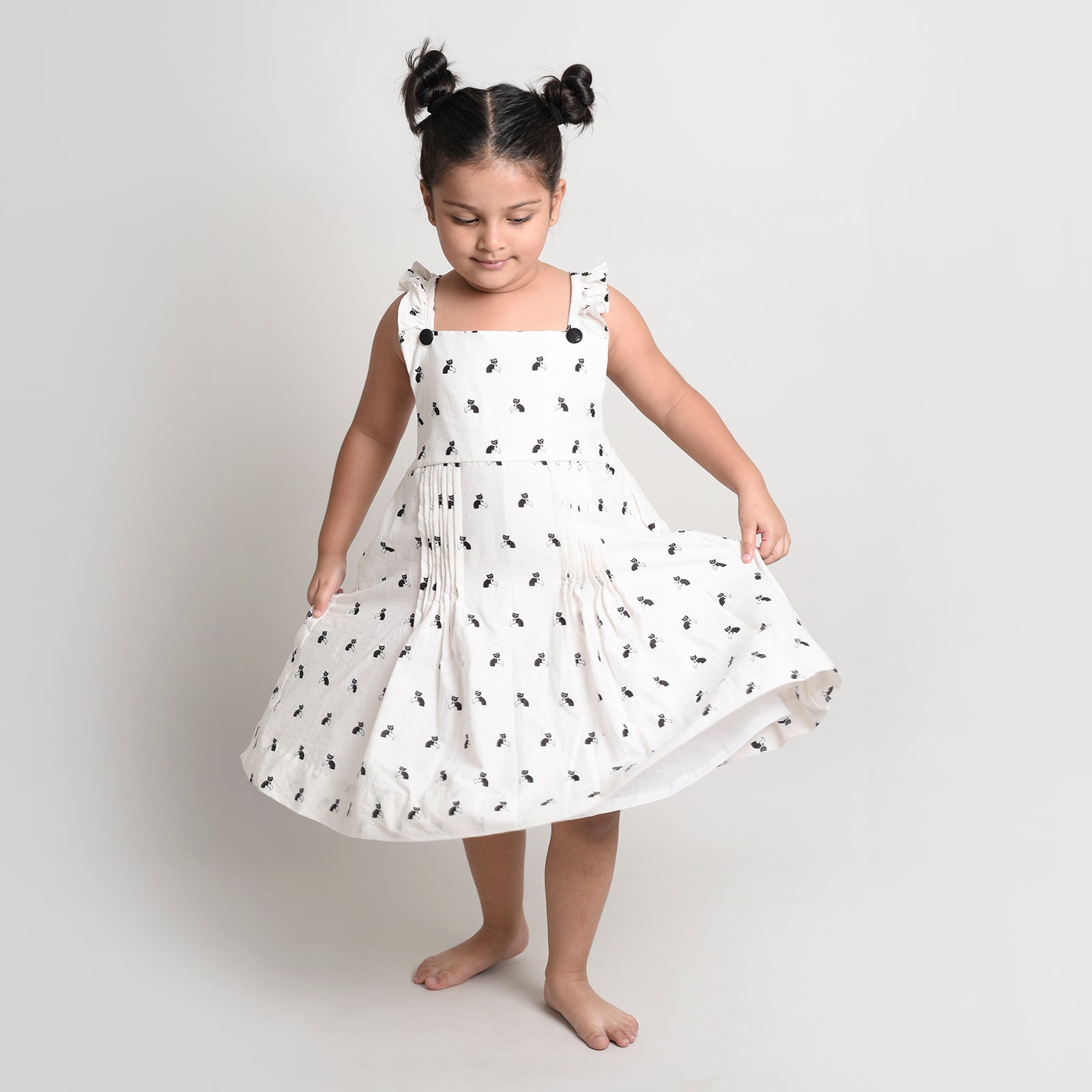 Cotton Printed Crisscross Back Frock For Girls with Bell The Cat Print White