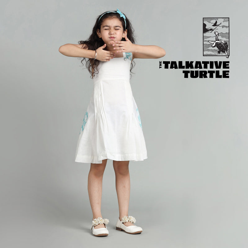 Cotton White Crisscross Back Frock For Girls with The Talkative Turtle Print