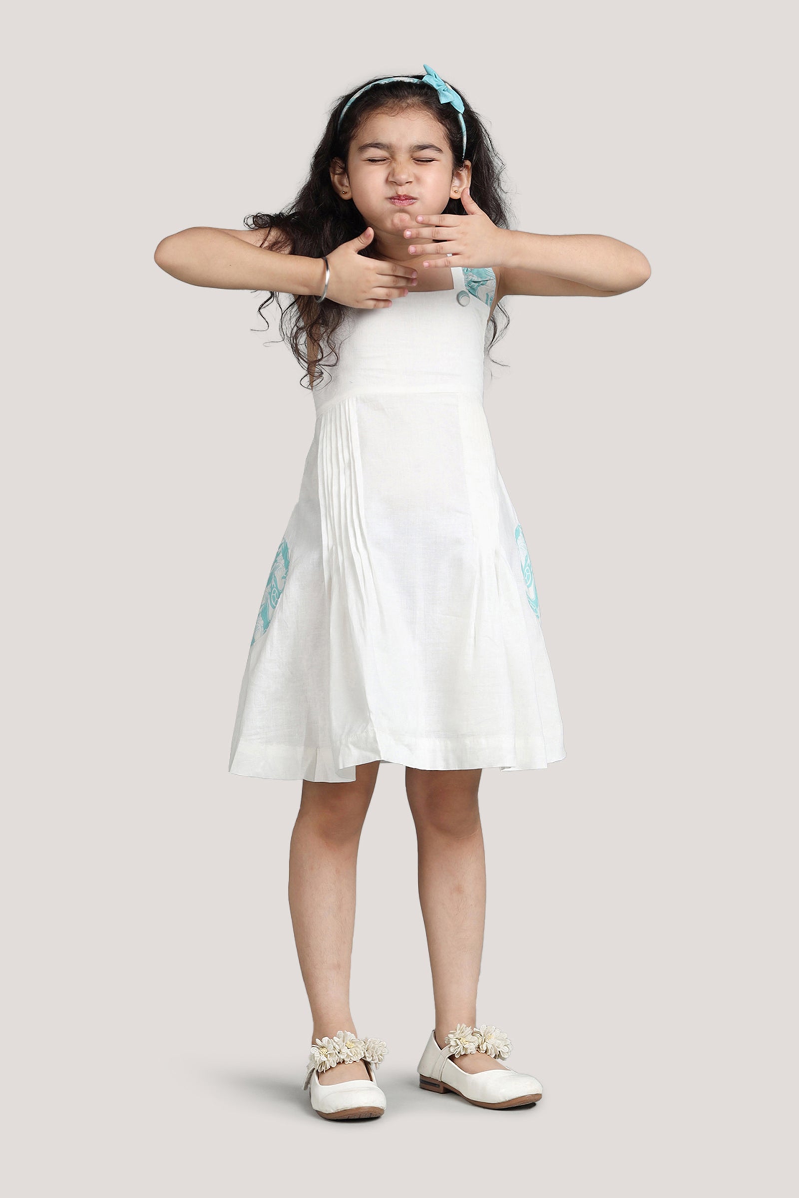The Talkative Turtle - White Crisscross Frock