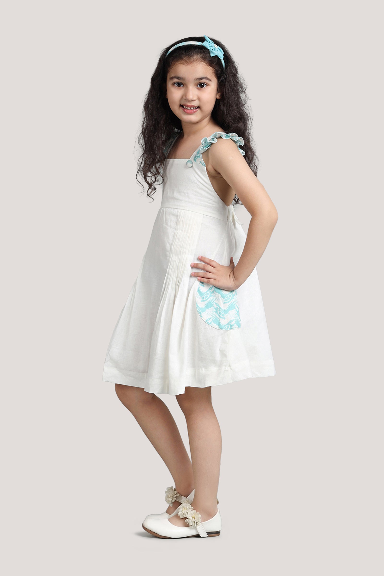 The Talkative Turtle - White Crisscross Frock