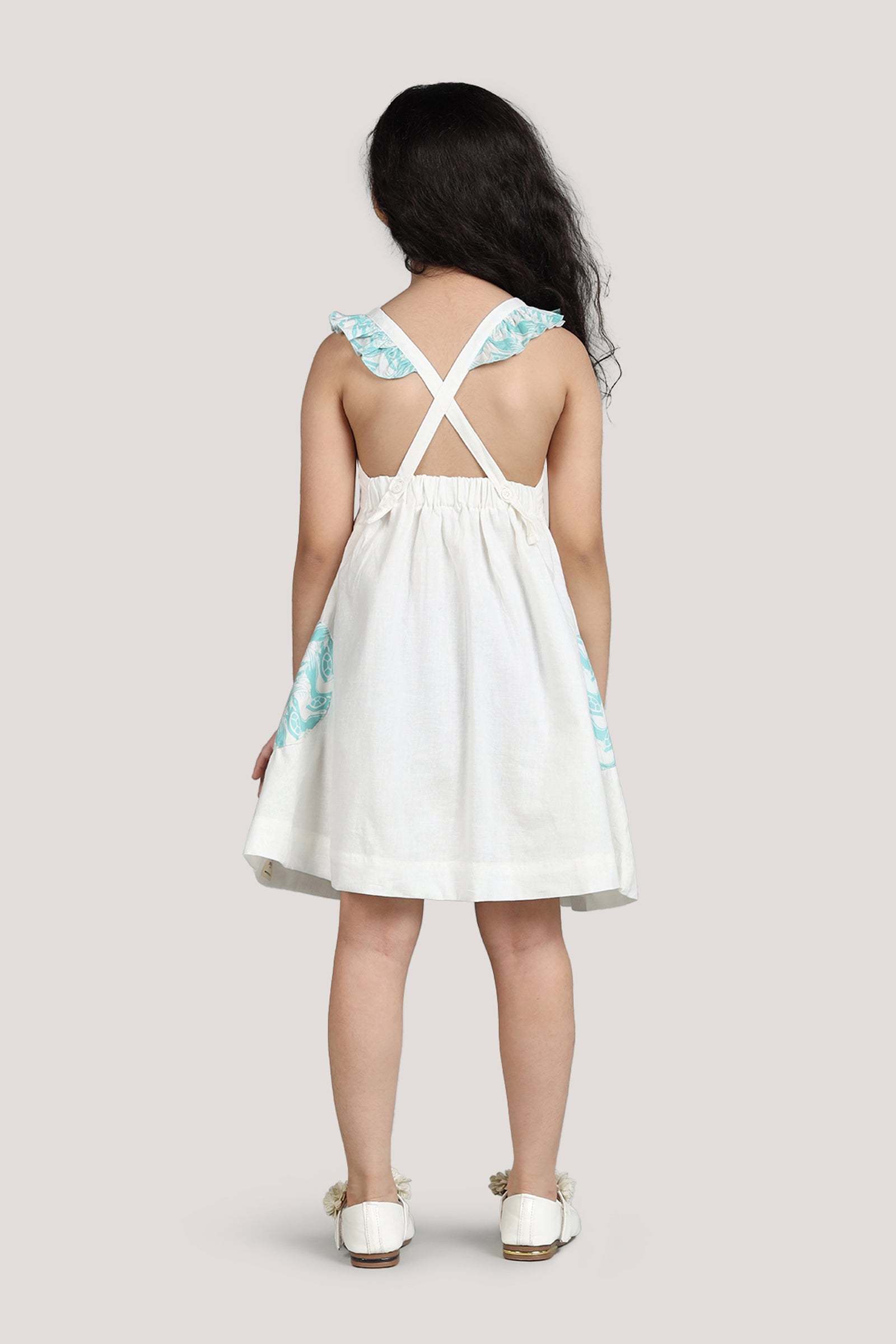 The Talkative Turtle - White Crisscross Frock