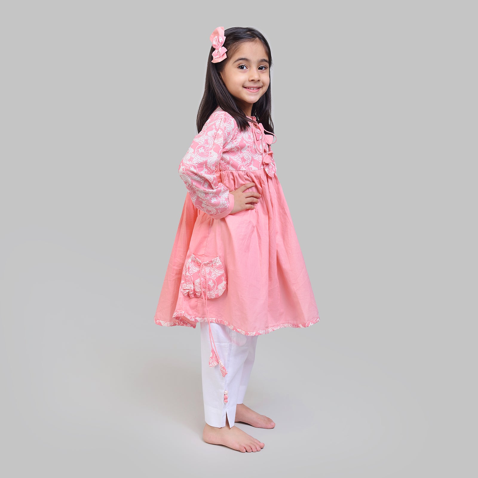 Cotton Full Sleeve Round Neck Kurta with Side Pockets And White Pants For Girls with The Foolish Lion & The Clever Rabbit Print