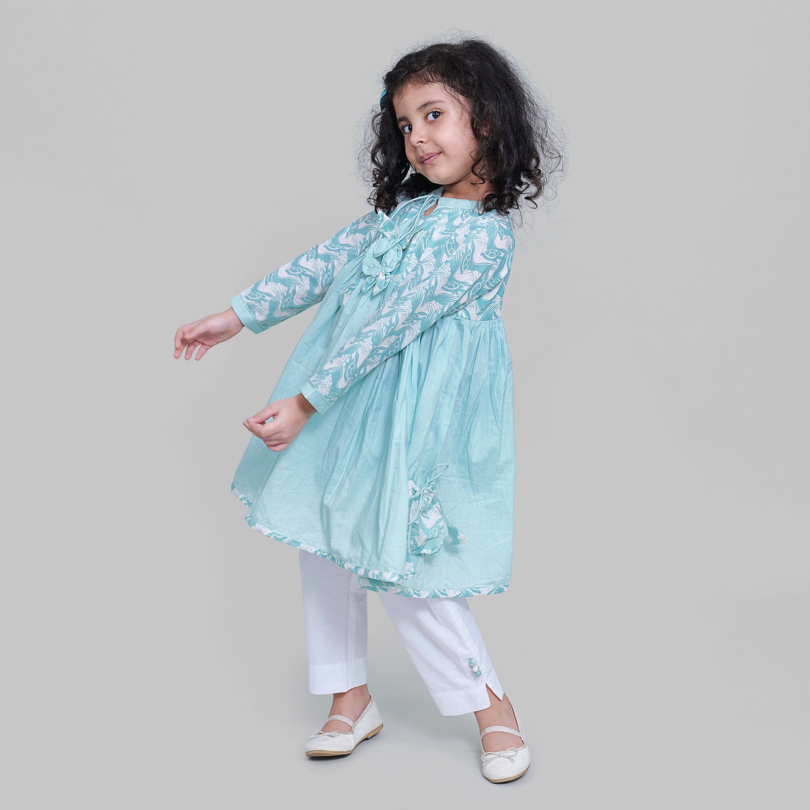 Cotton Full Sleeve Round Neck Kurta with Side Pockets And White Pants For Girls with The Talkative Turtle Print